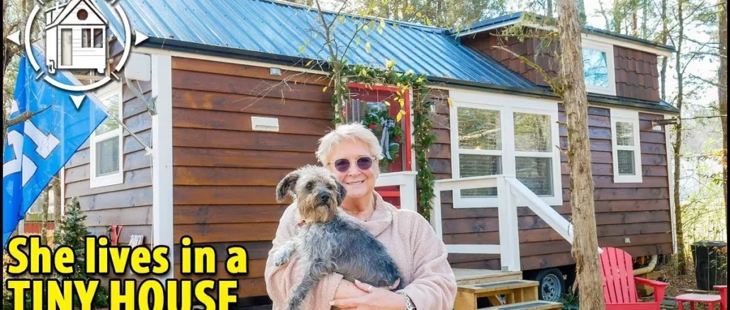 woman-holds-small-dog-madlyodd-POST23151